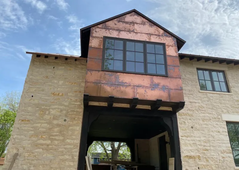 Copper metal panel facade on a stone building for Metal Roof Coating in Upper Freehold